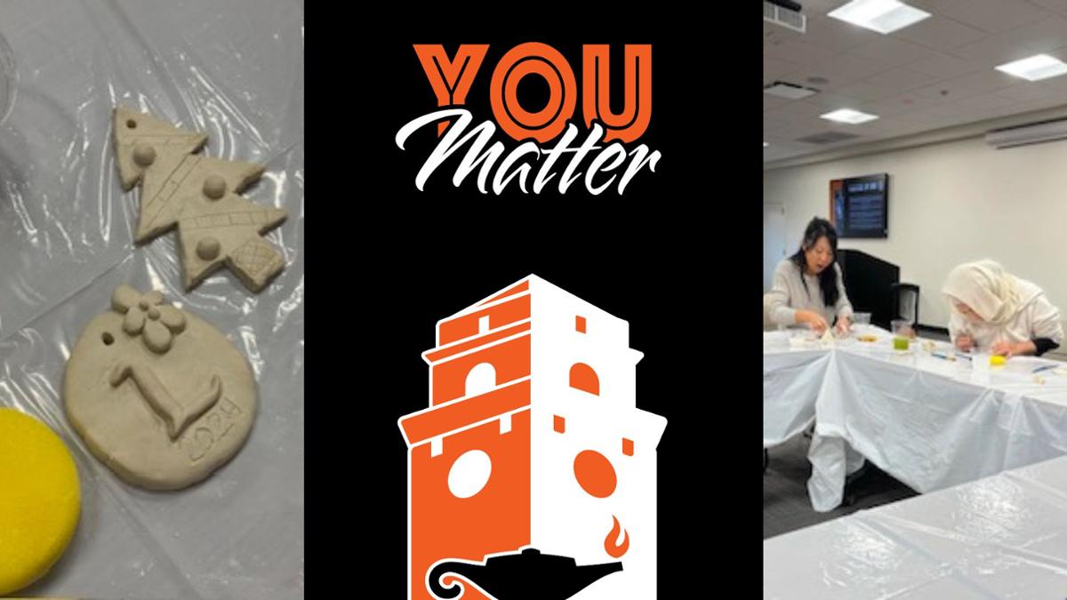 Students decorating clay cookies 