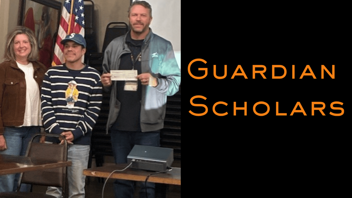 receiving the donation Jeremy and Whitney 