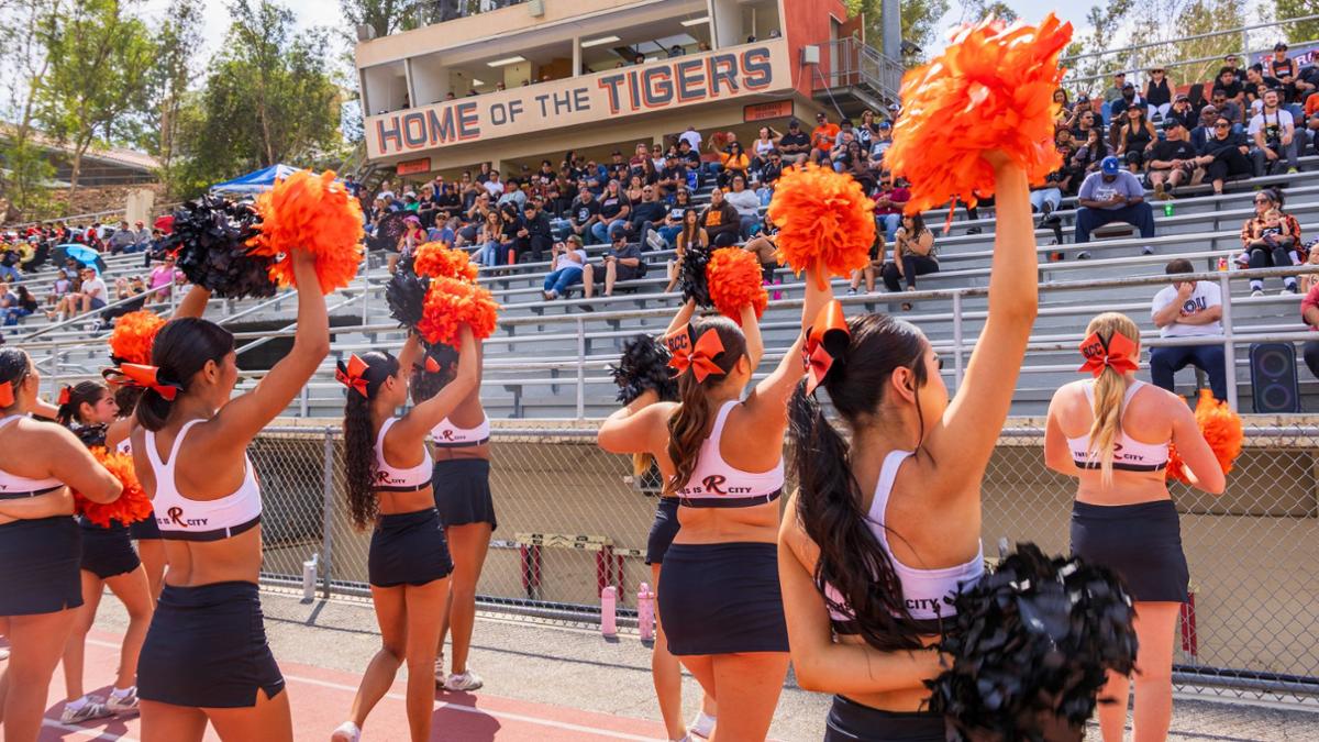 Students in the stadium - RCC cheerleaders during homecoming