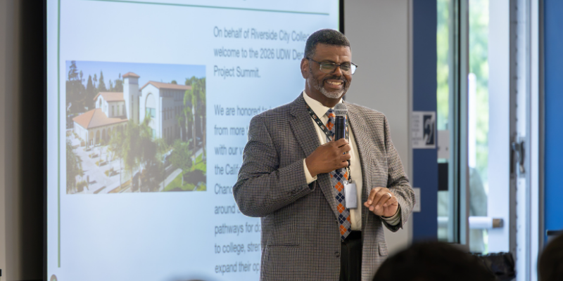 Dr. Bishop speaking at the UDW event Dr. Bishop speaking at the UDW event