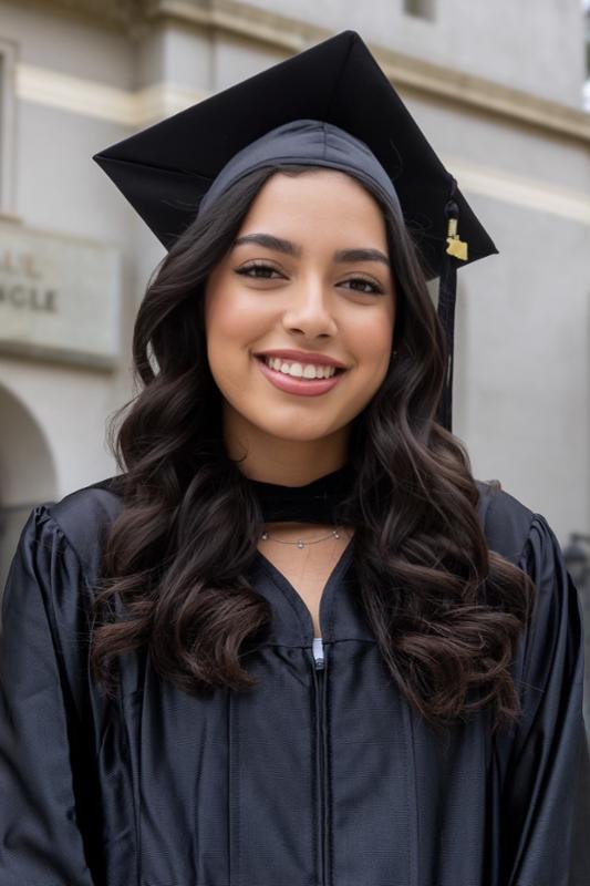 ASRCC President Clarissa  in graduation regalia